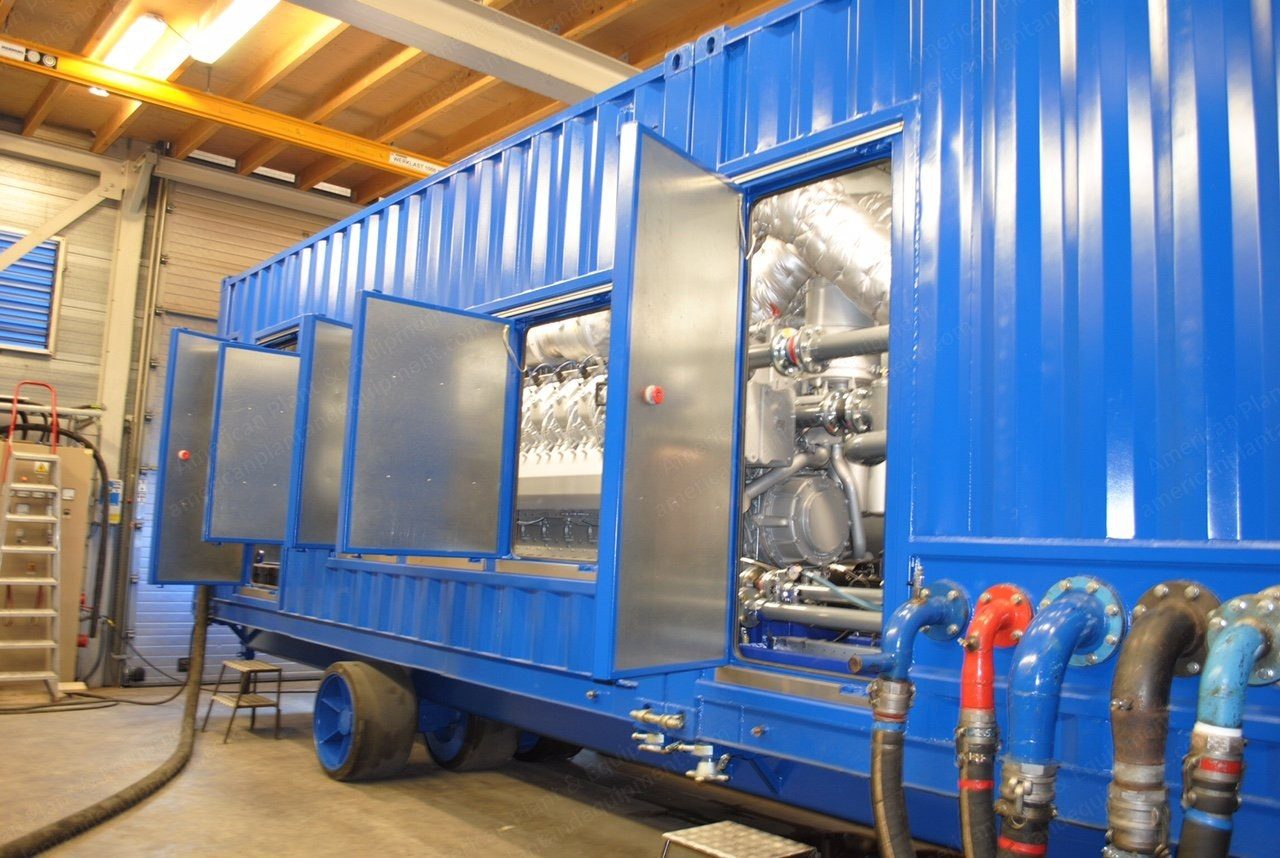 Containerised combined heat and power gas generator package with pipework connections.